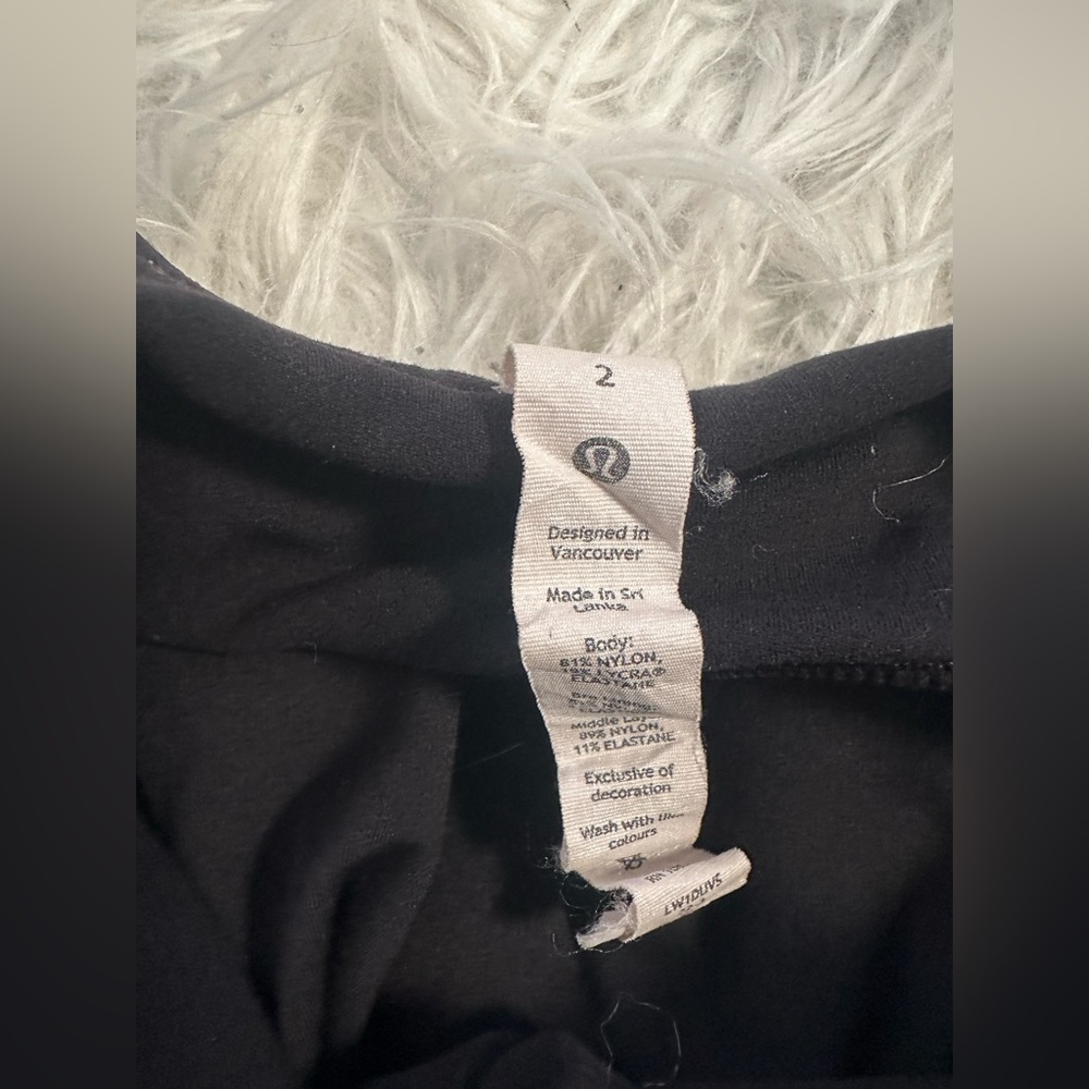 Size 2 in Lululemon. Black! Only worn once.